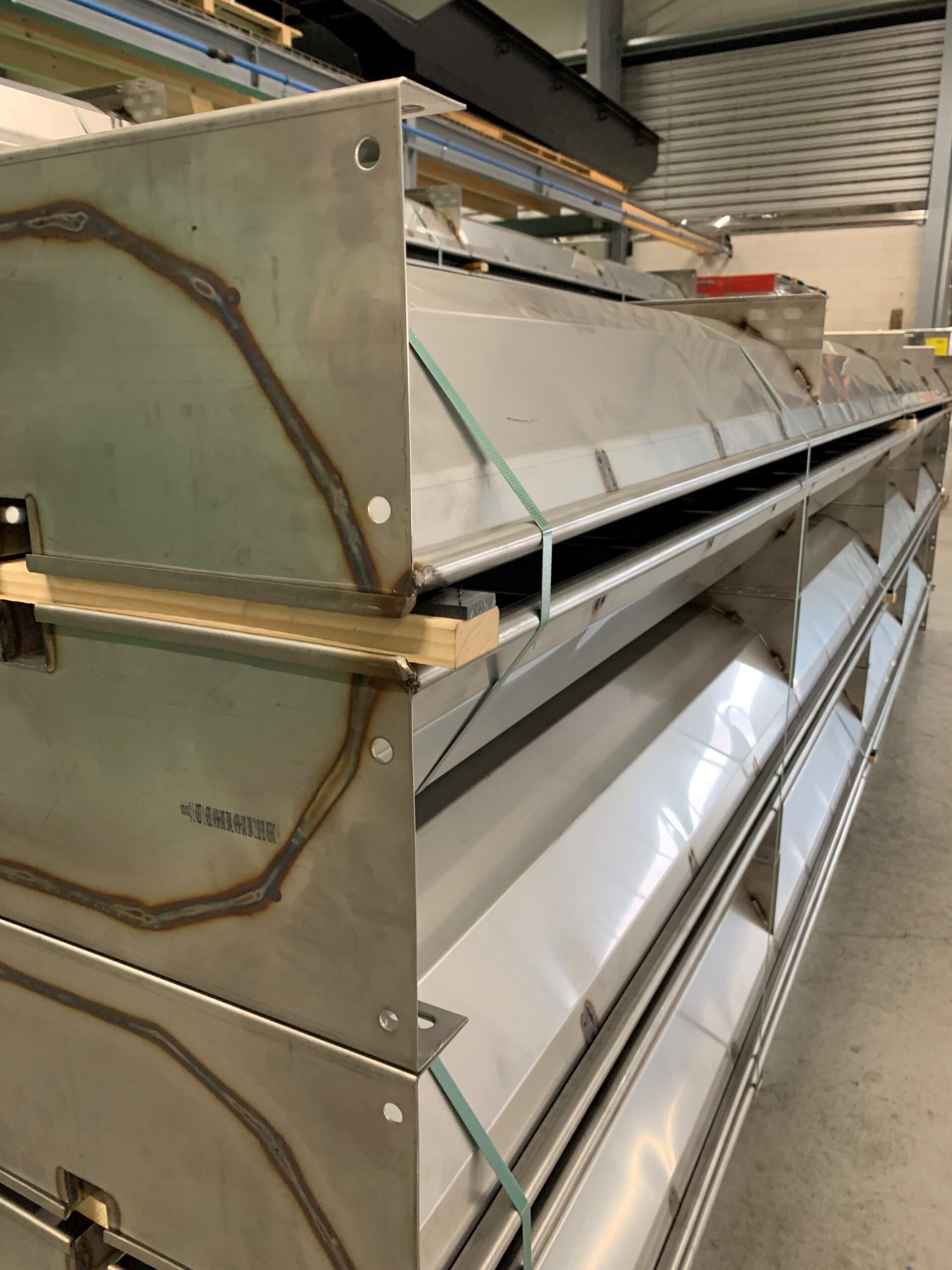 Duvvele pig trough with a fenced edge, stacked Close-up of pig trough ready for the customer